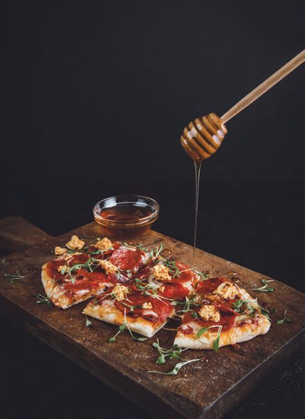 With a drizzle of hot honey, the Pepperoni Buzz flatbread is a must-order. PHOTO COURTESY OF PUTTSHACK