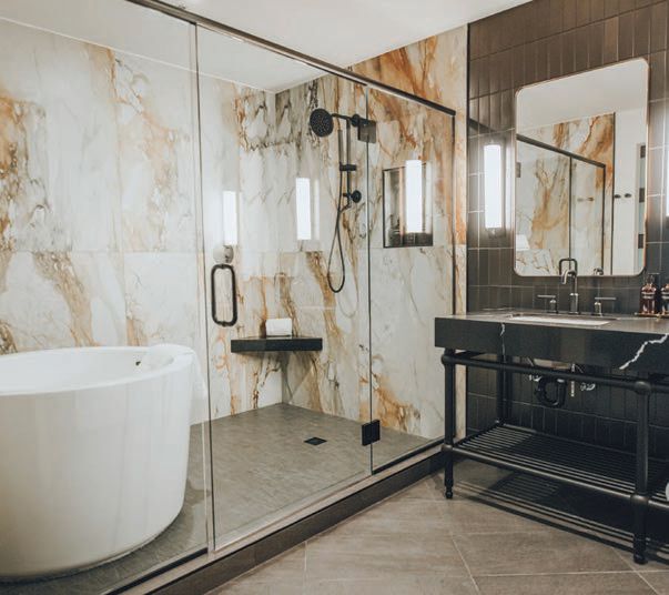 The Bellyard suite bathroom features a Japanese soaking tub in its walk-in shower PHOTO BY CALEB JONES