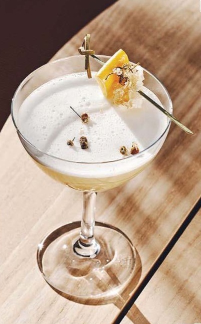 The Honey Bee with Watershed chamomile gin, honey, lemon and egg white. PHOTO BY ANDREW THOMAS LEE