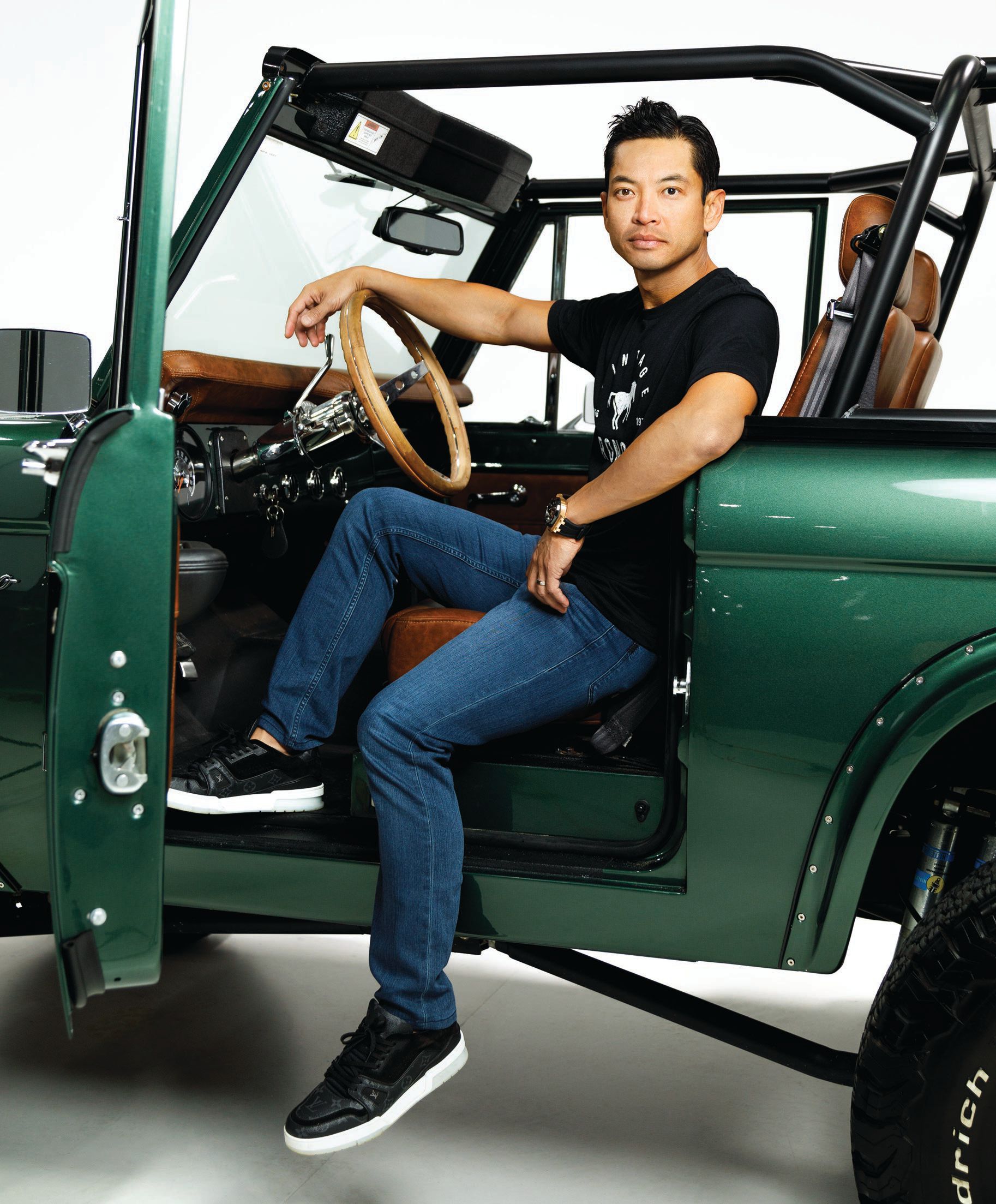 Chau Nguyen inside a Dark Moss Vintage Bronco custom created for actor Chase Stokes PHOTO BY PATRICK HEAGNEY
