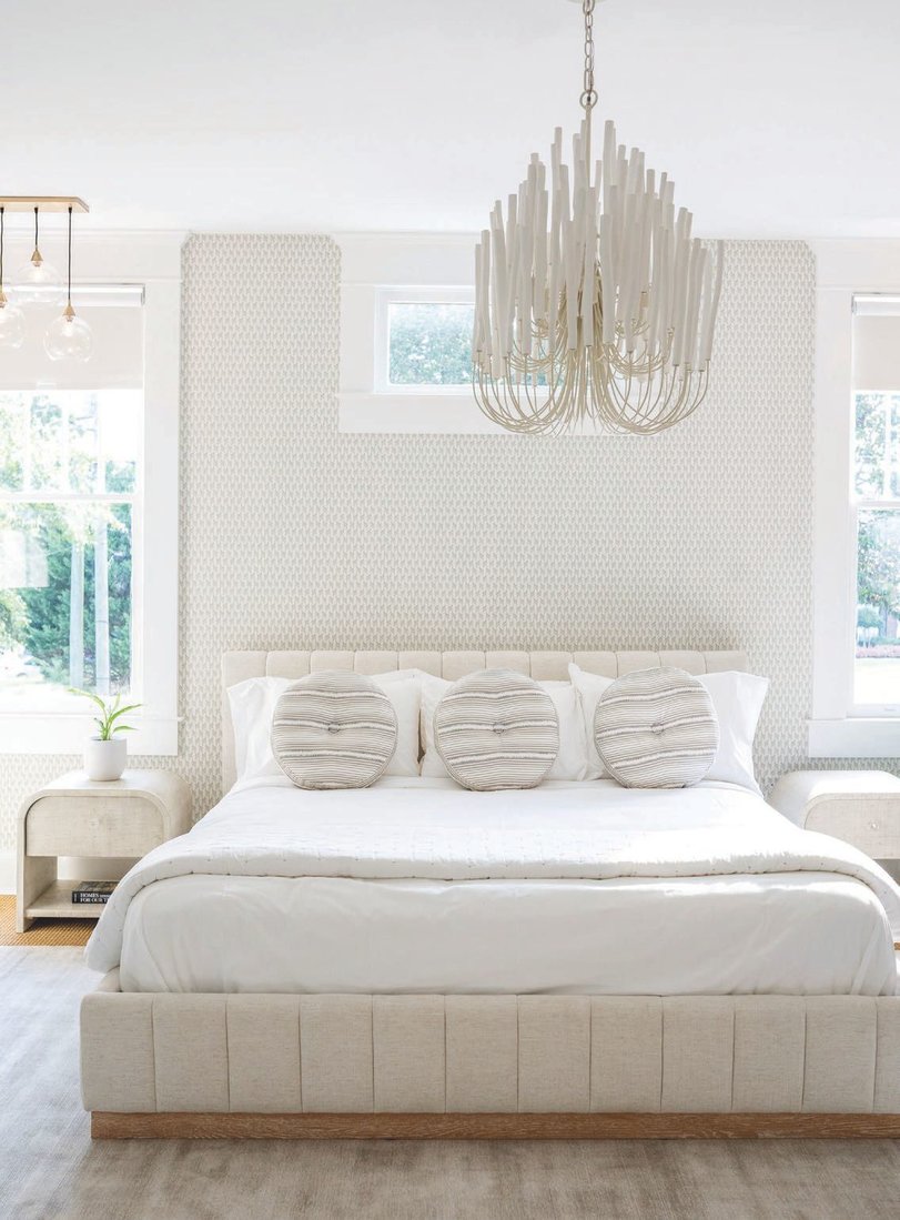 Every room in the bed-and-breakfast, including the De Soto shown here, was strategically designed with chandeliers and sconces to make the home feel warm and inviting. PHOTOGRAPHED BY KAITIE BRYANT