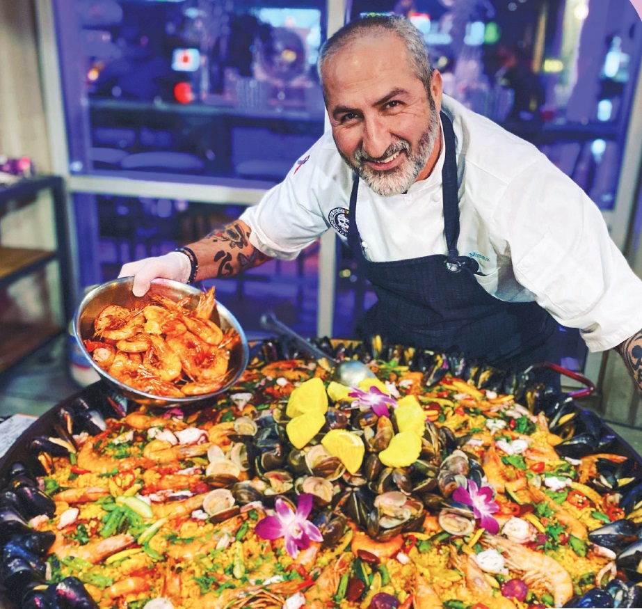 Chef Mimmo with his famous seafood paella PHOTO BY PRENTICE BETHEA