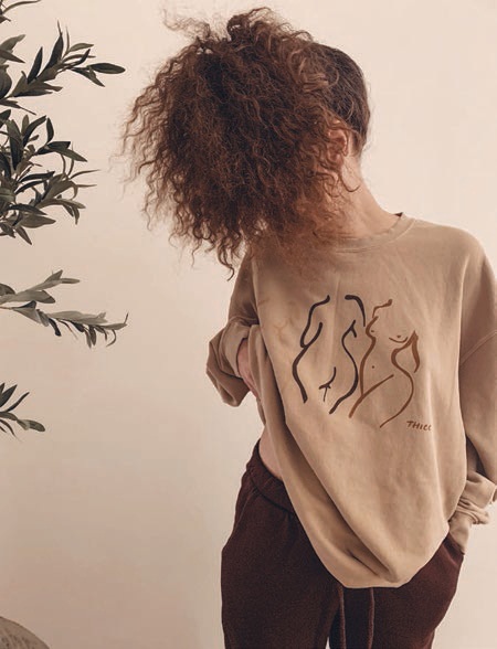 The Thicc sweatshirt in Melanin is a unisex, cozy crew neck featuring an original design painted by Atlanta-based artist Faatimah Stevens. PHOTO COURTESY OF SOUK BOHEMIAN